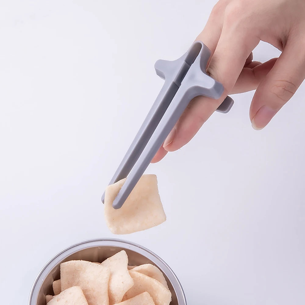 Finger Snack Chopsticks – No Mess Gaming & Reading Tool