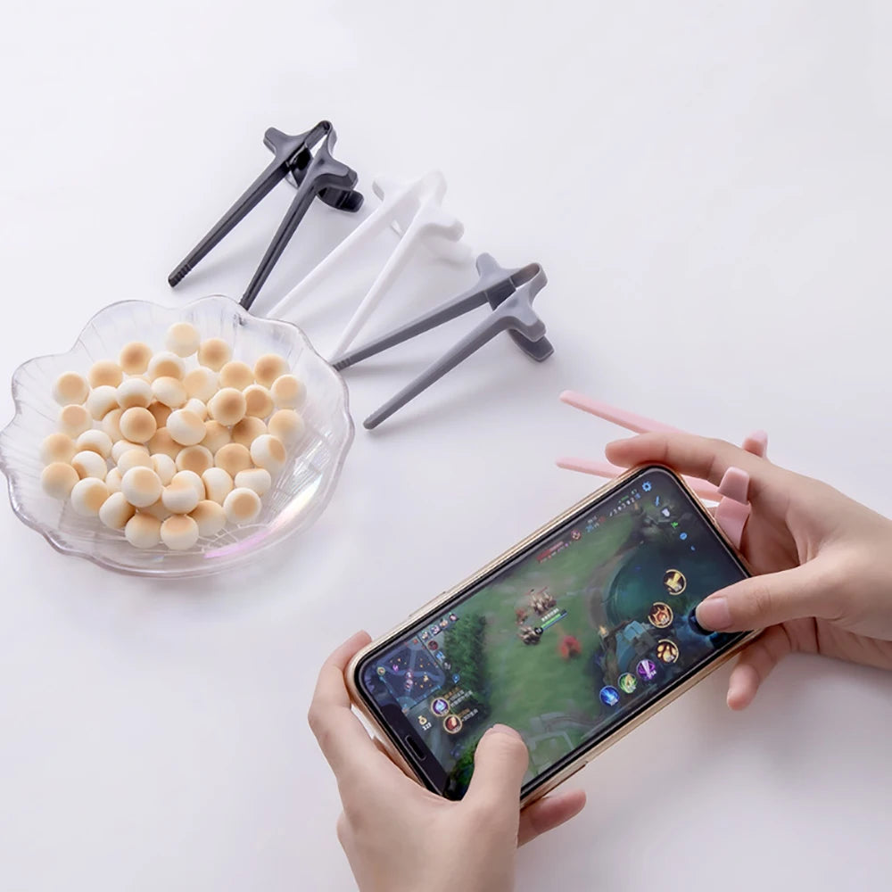 Finger Snack Chopsticks – No Mess Gaming & Reading Tool
